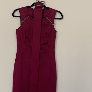 Form fitting belted dress